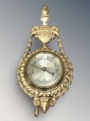 A reproduction painted and gilt barometer, length 40 cm.
