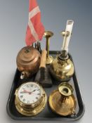 A brass Danish desk flagpole, oil lamp, pair of candle holders, copper kettle,