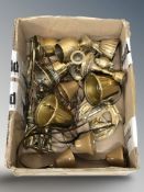 A group of brass door / servant's bells, figural bells, a trench art match holder, etc.