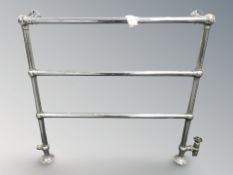 A chrome radiator/towel rail,