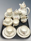 Twenty three pieces of KPM floral decorated tea china.