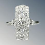 An Art Deco diamond panel ring, the brilliant-cut stones weighing an estimated 0.