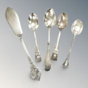 Four various silver teaspoons and a cake knife. CONDITION REPORT: 80g gross.
