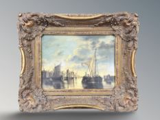 A gilt framed picture depicting trading ships in a dock, 29 cm x 39 cm.