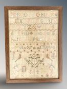 An old tapestry alphabet sampler 30 cm x 22.