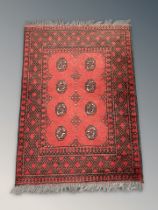 A Turkoman rug, Afghanistan, 120 cm x 81 cm.