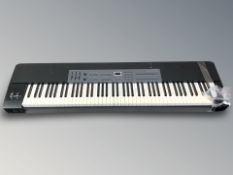 A Pro Keys 88 premium digital piano, with lead.