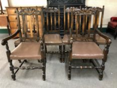 A set of six reproduction stained oak and studded leather dining chairs.