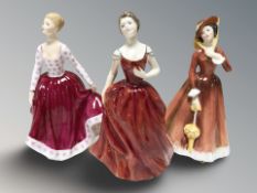 Three Royal Doulton figures 'Innocence' HN2842, 'Julia' HN2705 and 'Fiona' HN2694.