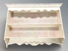 A painted shabby chic wall shelf, width 98 cm.