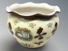 A 19th century transfer printed pottery planter, height 18 cm.