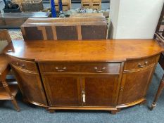 A reproduction yew wood break-front sideboard,