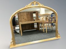 A reproduction gilt framed mirror in the Victorian style,