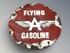 A reproduction Flying Gasoline circular tin sign, diameter 30 cm.