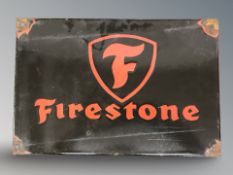 A reproduction Firestone rectangular tin sign, 30 cm x 20 cm.