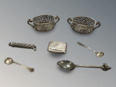 Two pierced silver salts, two caddy spoons, a further plated spoon,