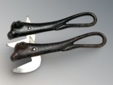 Two vintage can openers in the form of bulls, length 16 cm.