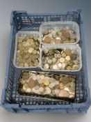 Four tubs of British pre-decimal coins including threepence pieces, copper coinage, etc.