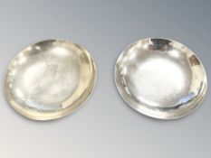 A pair of silver dishes, stamped sterling, diameter 9 cm. CONDITION REPORT: 85.
