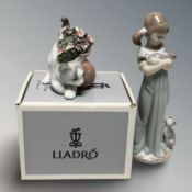 A Lladro figure 'Secret Spot' No. 6566, in box, and a further figure of a girl holding a kitten.