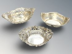 Three pierced silver baskets, largest 10 cm wide. CONDITION REPORT: 54.5g gross.