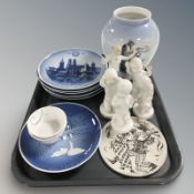 A Danish Copenhagen porcelain vase depicting a blacksmith, several figurines,