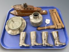 A group of collectables to include wooden football rattle, silver plated boots,