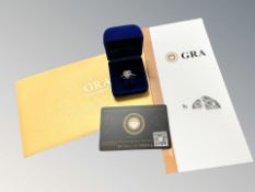 A Sterling silver ring with 1ct round moissanite set in heart shape setting,