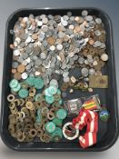 A quantity of continental coins, enameled lapel badges, etc.