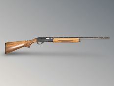 A Remington 1100, 20 bore semi-automatic shotgun, numbered R028001K, barel 25