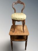 A mahogany two tier occasional table, width 55 cm, and an occasional chair.