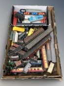 A group of die cast rolling stock including passenger cars, wagons, etc.