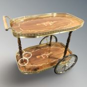 An Italian style marquetry and gilt metal drinks trolley,