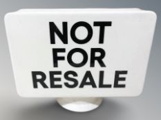 A 'Not for resale' petrol globe sign, height 30 cm.