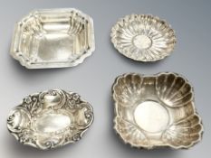Four various silver dishes, largest 8 cm wide. CONDITION REPORT: 122.9g gross.