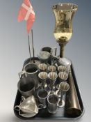 Two desk flag poles, pewter tankards and other metal wares.