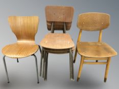 Four 20th century laminated wood stacking chairs and two further chairs