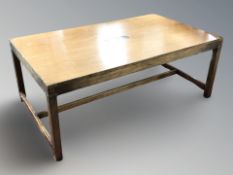 A continental teak rectangular coffee table, with brass capped corners,