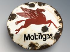 A reproduction Mobil Gas circular tin sign, diameter 30 cm.