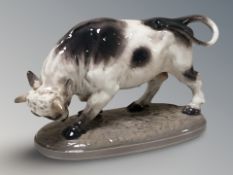 A Danish Copenhagen porcelain figure of a bull, numbered 1302, length 22 cm.