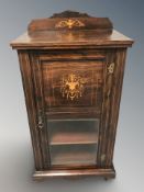 A late Victorian rosewood and satinwood marquetry music cabinet, 55 cm x 38 cm x 105 cm.