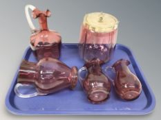 Five pieces of antique cranberry glass.