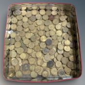 A large quantity of three pence pieces.