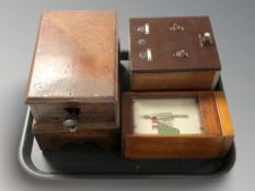 A railway light control switch and two further railways apparatus.