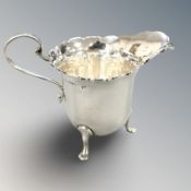A silver cream jug, height 8 cm. CONDITION REPORT: 65.6g.
