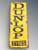 A reproduction Dunlop Tyres rectangular tin sign, 40 cm x 15 cm.