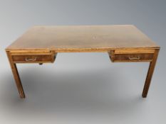 20th century teak and plywood writing desk fitted with two drawers,