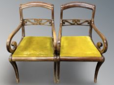 A pair of continental mahogany framed armchairs