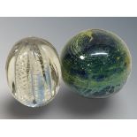 A Mdina / Isle of Wight magnum paperweight and a further clear glass paperweight with bubble