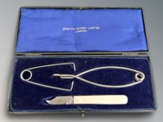 A vintage Spratt's caponizing set